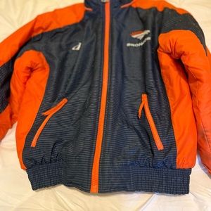 Woman’s medium Denver broncos jacket. Used, missing zip on hood